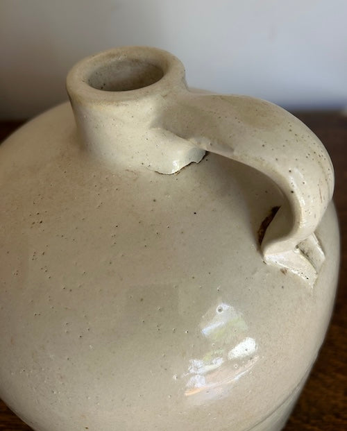 A Salt Glazed Primitive Americana Stoneware Whiskey Jug